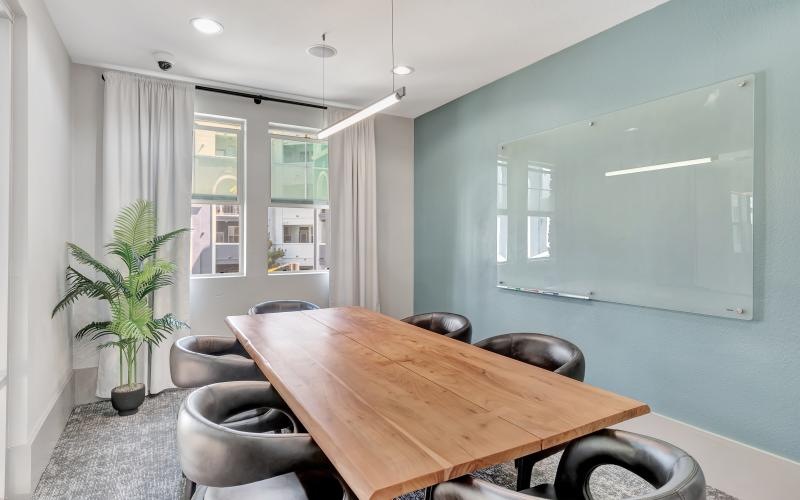 a room with a table and chairs