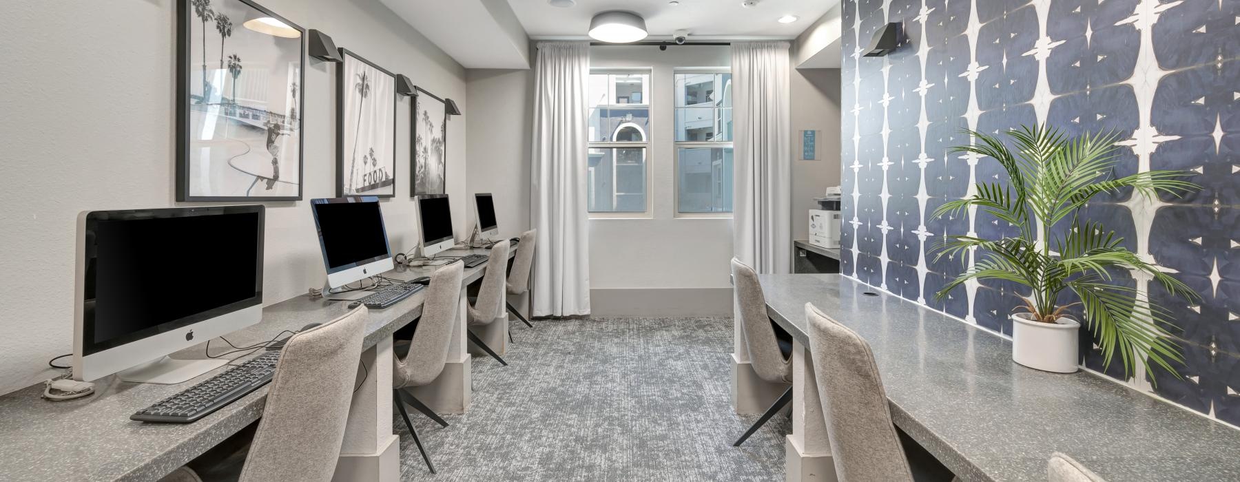 an office with a desk and computer