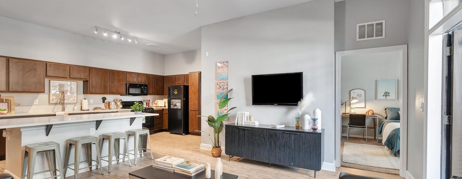 a living room with a tv and a table